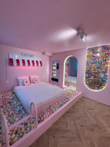 Maisons de vacances Capsule Candy - piscine a boules - cinema prive : photos des chambres