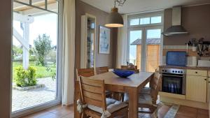 Haus am Achterwasser - Ferienwohnung im EG