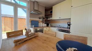 Haus am Achterwasser - Ferienwohnung im EG