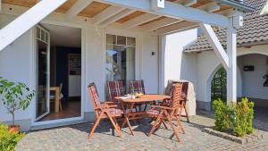 Haus am Achterwasser - Ferienwohnung im EG