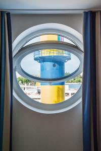 Apartment 9 "Am alten Leuchtturm", Blickrichtung Innenstadt, Binnenhafen West, seitlicher Meerblick, Hafenspitze