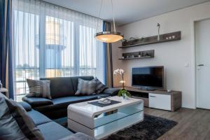 Apartment 9 "Am alten Leuchtturm", Blickrichtung Innenstadt, Binnenhafen West, seitlicher Meerblick, Hafenspitze