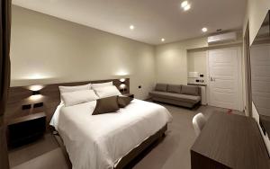 Chambre Deluxe (2 Adultes + 1 Enfant)