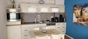 Apartment 26 "Strandgut", Blickrichtung StrandOffenes Meer