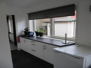 Holiday home in Petten with garden