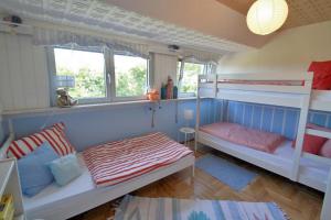 Ferienwohnung 11 mit großer Terrasse am Privatsee