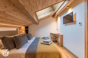 Appartements Chalet ARAVIS COSY - Spa & piscine : photos des chambres