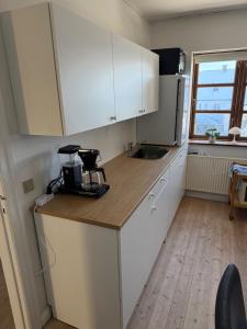 Meget central, fri parkering, 4-7 personers overnatningssted