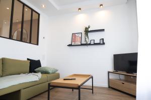 Appartements Troyes - Aux pieds du cube : photos des chambres