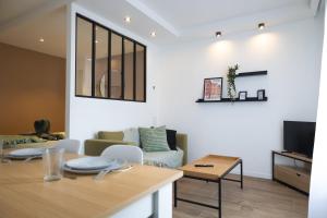 Appartements Troyes - Aux pieds du cube : photos des chambres