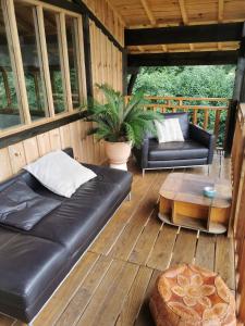 Maisons de vacances Maison bois, entre ville et lac : photos des chambres