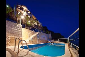Unique Dalmatian Seafront Villa -in a 300 m2 Mediterranean garden with private beach, large pool and terrace.