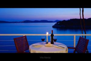 Unique Dalmatian Seafront Villa -in a 300 m2 Mediterranean garden with private beach, large pool and terrace.