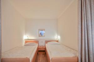 FeWo Wienand 1-5-5 - Strandappartements am Leuchtturmweg