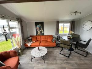 Neues Ferienhaus Chalet Nr73 zweite Reihe direkt am Wattenmeer, komplett eingezäunt