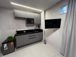 Loft Confortável com Ar, Cozinha e Wi-Fi no Centro
