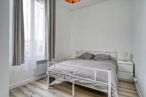 Appartements Appartement fonctionnel & lumineux-Portes de Paris : photos des chambres