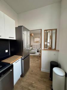 Appartements Le National 2 Appartement centre ville avec Parking prive : photos des chambres