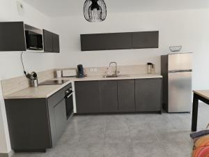 Appartement à 50 m de la mer, idéal famille