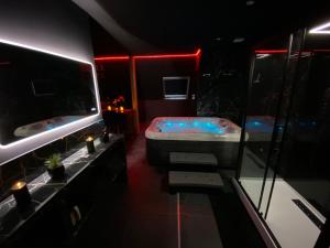 Appartements Love room spa : photos des chambres