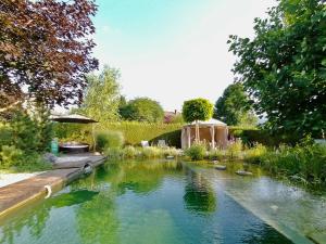 Garden Paradise Bled Apartments - garden, pond and castle view