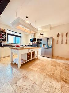 Villas A 1min d-une base nautique Maison spacieuse avec piscine : photos des chambres