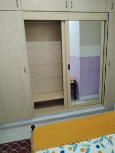 Built-in cabinet room with balcony