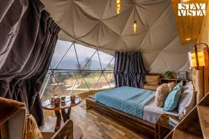 StayVista at The Stargazer with Mountain Views, Bonfire, Lawn