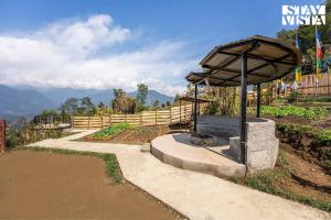 StayVista at The Stargazer with Mountain Views, Bonfire, Lawn