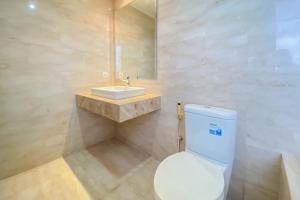 Spacious and Comfort Living 2BR at Menteng Park Apartment By Travelio