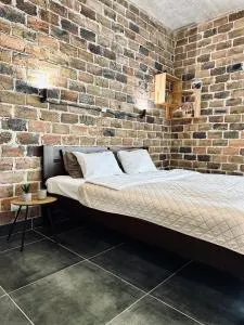 Modern apartments with a coffee machine in the city center, a view of the city - Khotsin