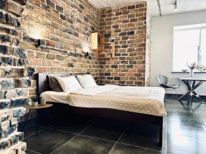 Modern apartments with a coffee machine in the city center, a view of the city