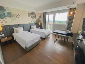 Phòng Hai Giường Đơn Loại Sang (Deluxe Twin Room)