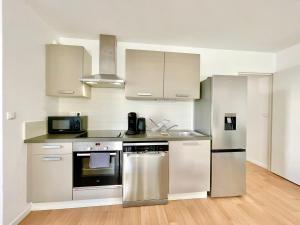 Appartements ParcAppart 5 - Terrasse - Parking - Netflix : photos des chambres