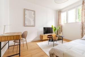 Appartements Le Paul - Gare - Calme - Jardin : photos des chambres