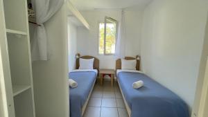 Maisons de vacances Chalet paisible a la plage, piscine et tennis : photos des chambres