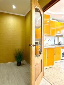 Apartments with a coffee machine in the city center, near a park and Zlata Plaza