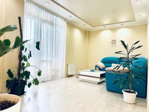 Apartments with a coffee machine in the city center, near a park and Zlata Plaza