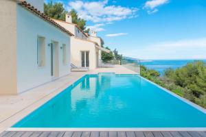 Villas L Oasis Moderne piscine vue mer : photos des chambres