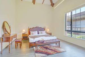 ELIVAAS Villa 39 - Serene 6 BHK Retreat with Pvt Pool, Gaming Zone & Balcony