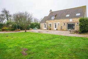 Appartement cosy à Sainte-Marie-du-Mont avec jardin 25m²