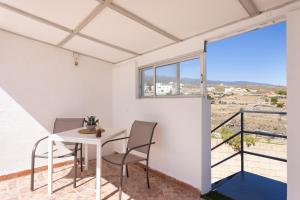 Oasis Tenerife Rentals con Piscina climatizada, Cocina exterior y Barbacoa