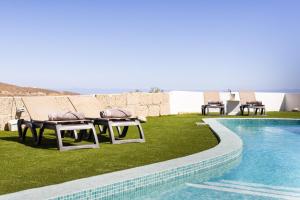 Oasis Tenerife Rentals con Piscina climatizada, Cocina exterior y Barbacoa