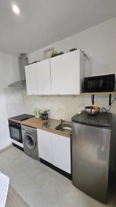 Appartements Maison La Valenciennoise : photos des chambres