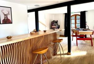 Chalets chalet la forgerie Piscine Jacuzzi Cinema : photos des chambres