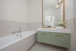 LUX Pastel Oasis Family Apartment with Parking & Gym by Renters Prestige