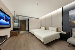 Atour Hotel Wuxi East Station South Square - 4hvězdičkové hotely ve městě Wu-si