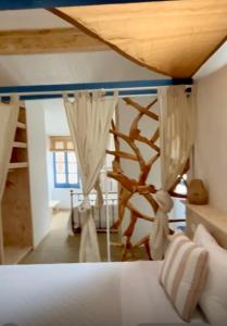 Maisons de vacances Gites La Maison pres de la fontaine et La Cabane du Pecheur : photos des chambres