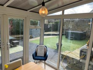 Honeybee Cottage, with a log fire & a hot tub.