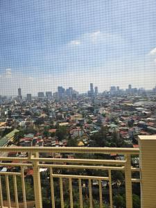 Zinnia Tower 2br condo with QC Cityview